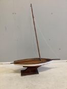 A painted pond yacht, height 103cm. Condition - fair