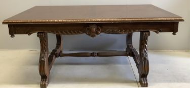 A Spanish style rectangular carved oak refectory table, width 180cm, depth 100cm, height 78cm.