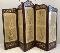 An Art Nouveau mother of pearl inlaid five fold screen, inset silk thread embroidered panels,