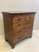 An 18th century feather banded walnut and oak chest, width 97cm, depth 53cm, height 100cm. Condition