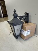 A set of four cast metal lantern wall lights with perspex windows, height 60cm. Condition - fair