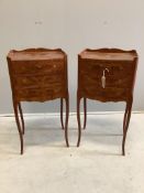 A pair of French marquetry inlaid kingwood three drawer bedside chests, width 37cm, depth 28cm,