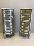 A pair of painted seven drawer serpentine tall chests, width 45cm, depth 37cm, height 120cm.