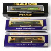 Three boxed Dapol and Graham Farish N gauge railway class 66 diesel-electric locomotives; Freightlin