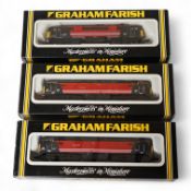 Three boxed Graham Farish N gauge railway locomotives in Virgin Trains livery; a class 47 Graham Far