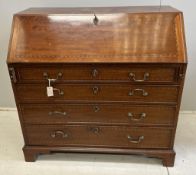 A George III mahogany bureau, width 108cm, depth 54cm, height 107cm. Condition - good, interior fair