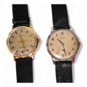 A gentleman's steel and gold plated Longines Conquest manual wind wrist watch, with baton numerals a
