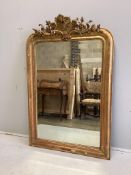 A 19th century French giltwood and composition overmantel mirror, width 92cm, height 140cm. Conditio