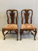 A pair of 18th century walnut dining chairs, width 52cm, depth 42cm, height 96cm. Condition - fair