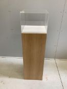 Three oak and perspex display plinths, largest height 145cm. Condition - fair