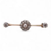 An early to mid 20th century yellow metal, split pearl and diamond cluster set bar brooch, 37mm, gro