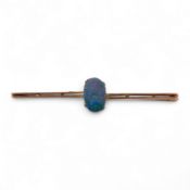 An early 20th century 9ct and single stone oval black opal doublet set bar brooch, 57mm, gross weigh
