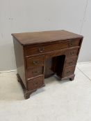 A 19th century mahogany kneehole desk, width 84cm, depth 43cm, height 75cm. Condition - fair