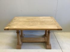 An 18th century style rectangular bleached oak refectory dining table, width 129cm, depth 86cm, heig