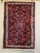 A Hamadan red ground rug, 160 x 104cm. Condition - fair to good