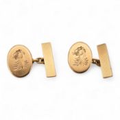 A pair of Elizabeth II 18ct gold oval cufflinks, engraved with lion's head crest, S.J. Rose & Son, B