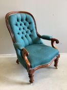A Victorian upholstered mahogany spoon back open armchair, width 68cm, depth 78cm, height 99cm. Cond
