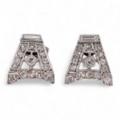 A pair of mid 20th century white metal and millegrain set diamond cluster set 'A' shaped ear studs(a