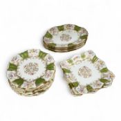 An early 20th century Wedgwood gilt and floral decorated dessert service, oval dishes 26cm wide (18)