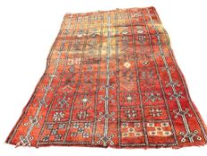 A Moroccan Berber pale red ground carpet, 300 x 190cm