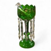 A large Victorian green glass lustre with drops, 45cm high