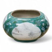 A Chinese enamelled porcelain oval bowl, Guandong kilns, early 20th century, green with en grisaille