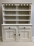 A 19th century Irish pine dresser with boarded rack, later painted, width 162cm, depth 49cm, height