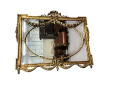 A Victorian style giltwood and composition overmantel mirror with cross torch and quiver crest, widt