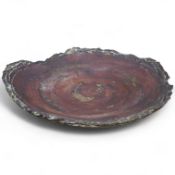 Dennis Fairweather, a large studio pottery flat dish with rough edges, 47cm wide