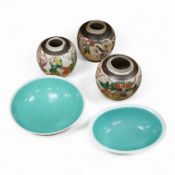 Three Chinese crackleglaze 'Warriors' jars without covers and two Chinese enamelled porcelain bowls.