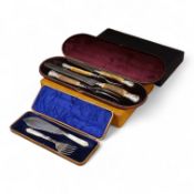 Four cased sets of silver plated flatware, including a carving set with antler handles, silver mount