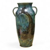 Jane Bridger, a fish designed, green glazed studio pottery two handled vase. 34cm high.