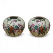 A pair of late 19th century Chinese famille rose jars, without covers, 19cm high.
