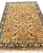 A North West Persian style peach ground carpet, 230 x 168cm