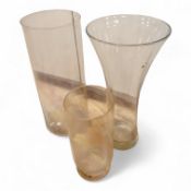Three large glass vases, tallest 60.5cm
