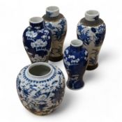 Chinese blue and white porcelain, late 19th century, comprising two prunus vases, two crackle glaze