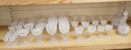 A Victorian heavy hobnail and star cut suite of table glass to include champagnes glasses and two de
