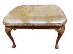 A George III style walnut extending dining table, (no leaves), 124cm, depth 104cm, height 74cm and s