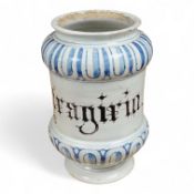 An 18th century Savona maiolica Albarello, inscribed in Manganese, 19cm high