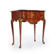 An early 18th century scarlet japanned lowboy