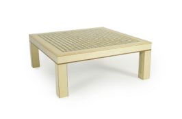 A contemporary square sycamore and specimen wood coffee table on square legs