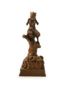A late 19th century French carved walnut figure of Pan