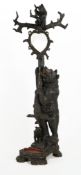 A late 19th century Black forest carved bear hallstand