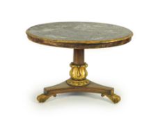 A George IV parcel gilt mahogany circular slate top centre table