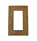 An Arts and Crafts embossed copper mirror, manner of Talwin Morris, Glasgow School