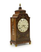 A Regency mahogany and cut brass inlaid bracket clock