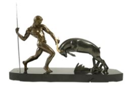 Attributed to Zoltan Kovasz (Romanian, 1883-1952), a bronzed spelter male hunter holding a chromed s