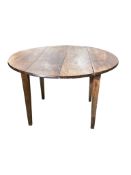 A 19th century French circular cherry kitchen table, diameter 113cm, height 74cm