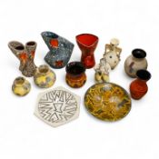 A collection of studio ceramics and pottery to include a Zsolnay vase and a Lyn Alves hexagonal