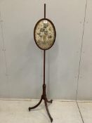 An early 19th mahogany pole screen, the banner inset with Chinese silk embroidery, height 163cm